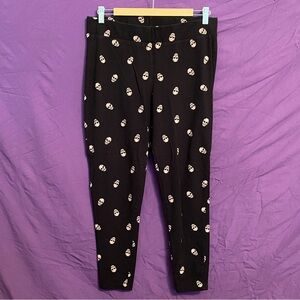 Torrid Black Leggings with Peach Skull Pattern. Size 2X.